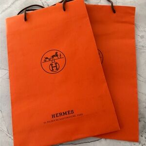 1x Hermes Orange Shopping Bag with Logo medium size for leather accessories